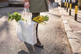 What are the benefits of buying reusable shopping bags?